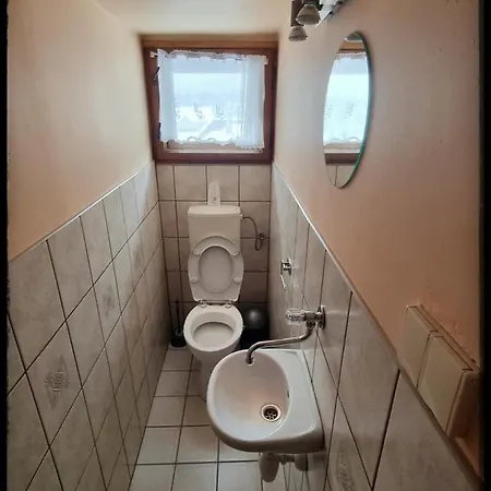 U Marka Quarto em Acomodações Particulares