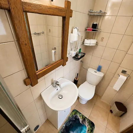U Marka Quarto em Acomodações Particulares