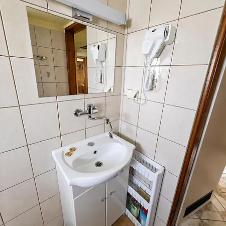U Marka Quarto em Acomodações Particulares